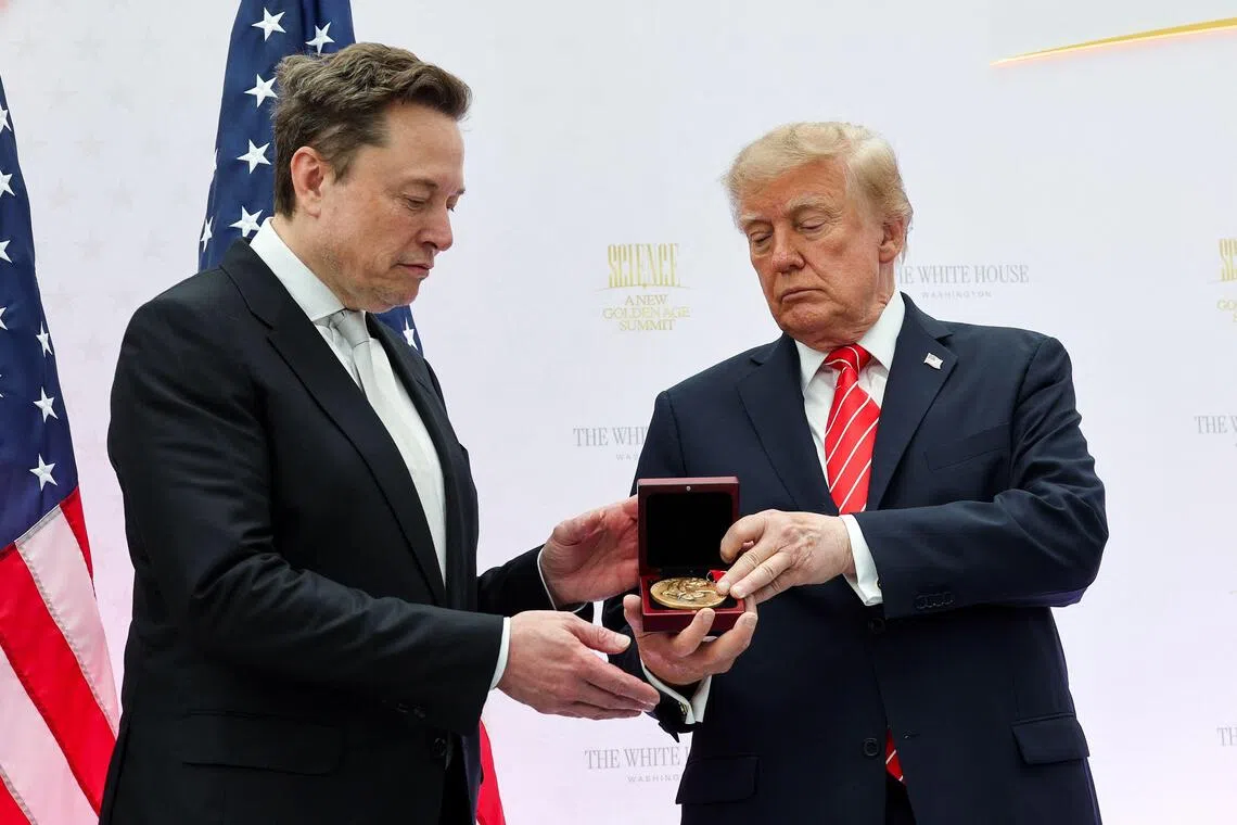 Elon Musk receiving the National Medal of Science from US President Donald Trump during the Golden Age of American Innovation Summit on Oct 8.